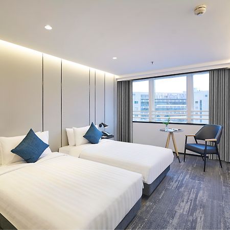 Hotel COZi Oasis Hongkong Buitenkant foto